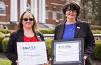 Glenville State University Financial Aid staff members Stephany Amos (left) and Sheri Goff with their FAAC® certificates. (GSU Photo/Kristen Cosner)