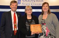 Glenville State College President Dr. Peter Barr (left) and Classified Staff Council Vice President Rachel Adams (right) with 2016 Classified Employee of the Year Carol Goodrich