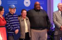 Glenville State University’s Curtis Elam Athletic Hall of Fame inductees for 2022 (l-r) Sarah Tingler representing Glenard Vannoy, Jim Scott, Kim West, Brian Hill, and Mark Gainer representing Earl “Tex” Gainer. Not pictured is Mike Eberbaugh. (GSU Photo/Dustin Crutchfield)