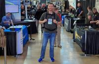 Glenville State University Assistant Professor of Criminal Justice Dr. Donal Hardin stands among the booths at the 2022 International Law Enforcement Educator and Trainers Annual Conference. The conference was held in St. Louis, Missouri.