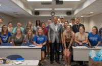 Glenville State University President Dr. Mark A. Manchin (center) with pre-nursing students. (GSU Photo/Kristen Cosner)