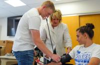 Glenville State University is working to address several healthcare workforce shortages through its various programs. Here, students practice skills inside a nursing simulation lab. (GSU photo)