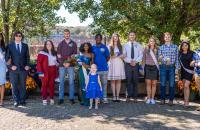 The 2022 Glenville State University Homecoming Court (l-r) Sophomore Princess Adria Chapple, Escort Garrett Watts, Senior Princess Abby Taylor, Escort Noah Schultz, Queen Jordyn Dansby-Ross, Court Attendant Lori Yeager, Escort Dane Lynch, Senior Princess Mary Pratt, Escort Pierre Venter, Junior Princess Kim Halsey, Escort John Kolodzieg, Freshman Princess Mimi Carr, and Freshman Prince Chris Goff. (GSU Photo/Kristen Cosner)