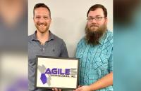 Agile5 Chief Security Officer Jacob Brozenick (left) with Glenville State University student James Amos. (Courtesy photo)