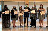 Spring 2021 inductees to Glenville State College’s Kappa Omicron chapter of international education honor society Kappa Delta Pi (l-r) KDP Counselor Dr. Gerda Kumpiene, Brittany Koutsunis, Raven Friend, Cali Hayes, Nic McVaney, Lori Ray, Caroline Tinnel, and KDP Counselor Dr. Jeff Hunter. (GSC Photo/Dustin Crutchfield)