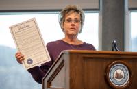 Rita Hedrick-Helmick, Vice President for Administration at Glenville State University, holds a copy of the resolution proclaiming November 30, 2022 as Pancreatic Cancer Awareness Day at Glenville State University. (GSU Photo/Kristen Cosner)