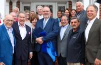 Surrounded by family, friends, and colleagues, West Virginia Board of Education President Paul Hardesty (center) was recently presented with an honorary degree from Glenville State University. (GSU Photo/Dustin Crutchfield)