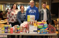 Glenville State College students who assisted with the Hidden Promise Scholars and Heart of the CommUnity Food Drive for the Pioneer Pantry included (l-r) Stormie Alverson, Brigitte Ellison, Tyler Moore, and Trey Waycaster (GSC Photo/Kristen Cosner)