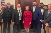 (l-r) Glenville State University’s Veteran Certifying Official Charles Yakubow, Marshall University SVA Chapter Associate Amond Bailey, Marine Corps veteran and Nicholas County Commissioner Gary Roberts, Senator Shelly Moore Capito, Marine Corps veteran and Marshall University SVA President Jamie Springston, Navy veteran and Marshall University SVA Chapter Associate Jaden Gilpin, and Army veteran and Glenville State University SVA President Keith Hardisty. (Courtesy photo)