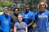 Glenville State University Student Government Association members (l-r) Dylan Day, Marcell Guy, Samantha Tanner, Jahzeiah Wade, and Michael Miller in front of Blackwater Falls. The group stopped for some sightseeing on their way home from the WV Student Leadership Conference. (Courtesy Photo)