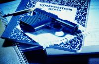 A gun and various school supplies.